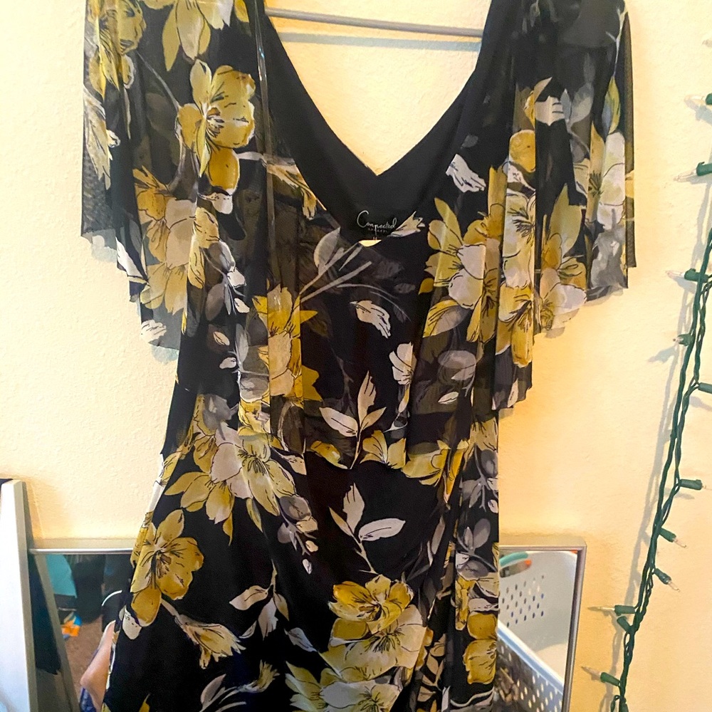 Black floral dress. Flutter Sleeves